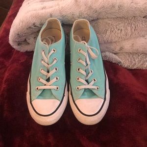 Teal blue tennis shoes